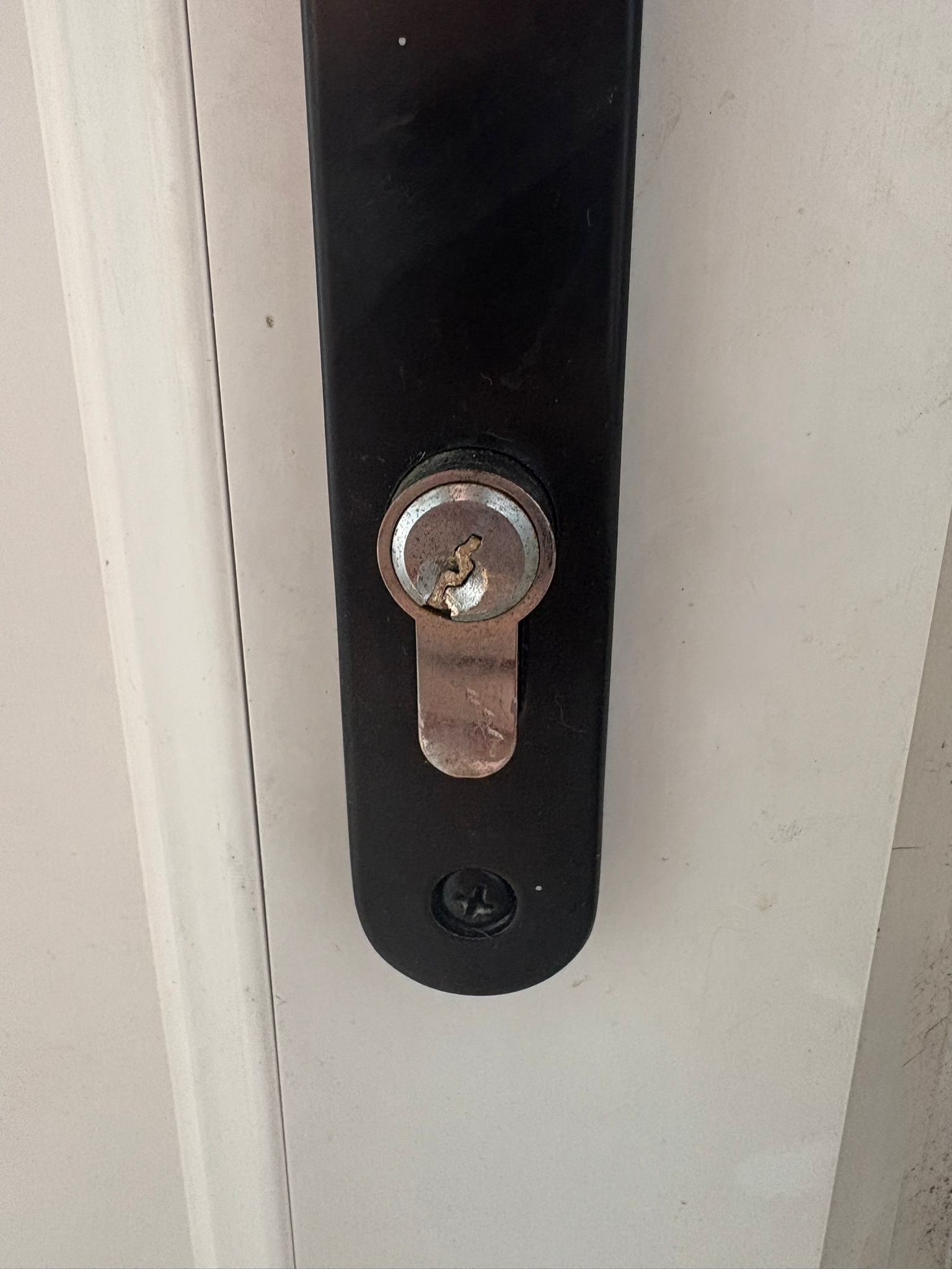 Damaged door lock cylinder after a snapped key incident repaired by JR Locksmiths in Codsall, Wolverhampton