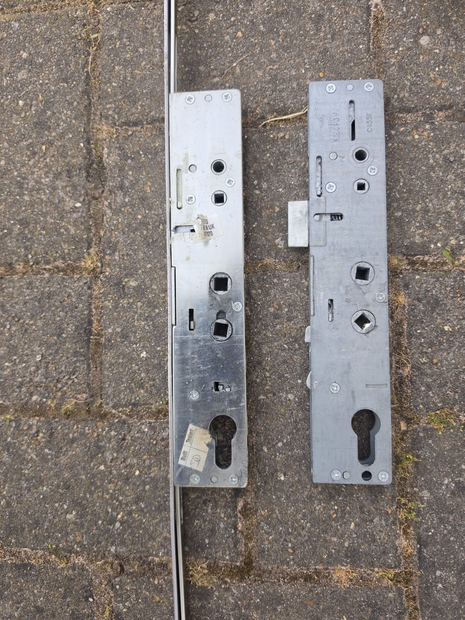 Old and new uPVC door gearbox during a gearbox replacement completed by JR Locksmiths in Aldersley, Wolverhampton